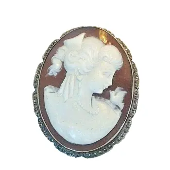 Vintage sterling silver carved cameo brooch pin mounted with marcasite stones