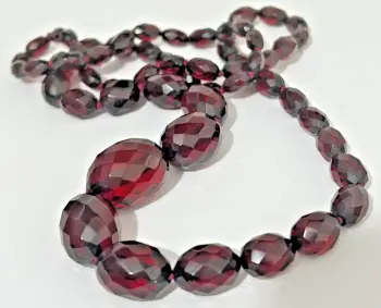 Antique graduated cherry amber faceted bead necklace hand knotted