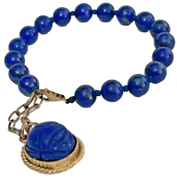 A Lapis Lazuli bead bracelet carved scarab pendant 9ct gold