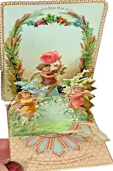 A Victorian Embossed Antique Victorian Paper Lace New Years Card C1890s Pop Up