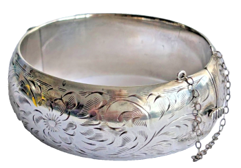 A Vintage sterling silver engraved hinged bangle 38 grams