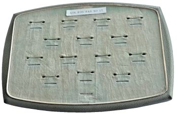 A Vintage jewellery jeweller shop display pad ring wedding rings