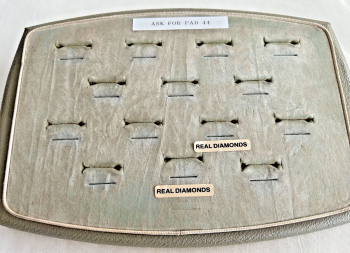 A Vintage jewellery jeweller shop display pad ring wedding rings