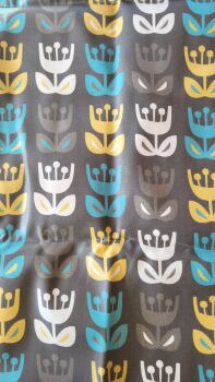 Coated cotton fabric with large flowers on a dark background