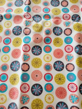 Coated cotton fabric - colourful circles on a light background