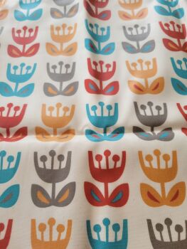 Coated cotton fabric with large flowers on a light background