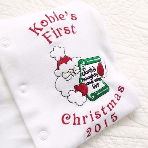 Personalised Baby's first christmas sleepsuit Santa's list
