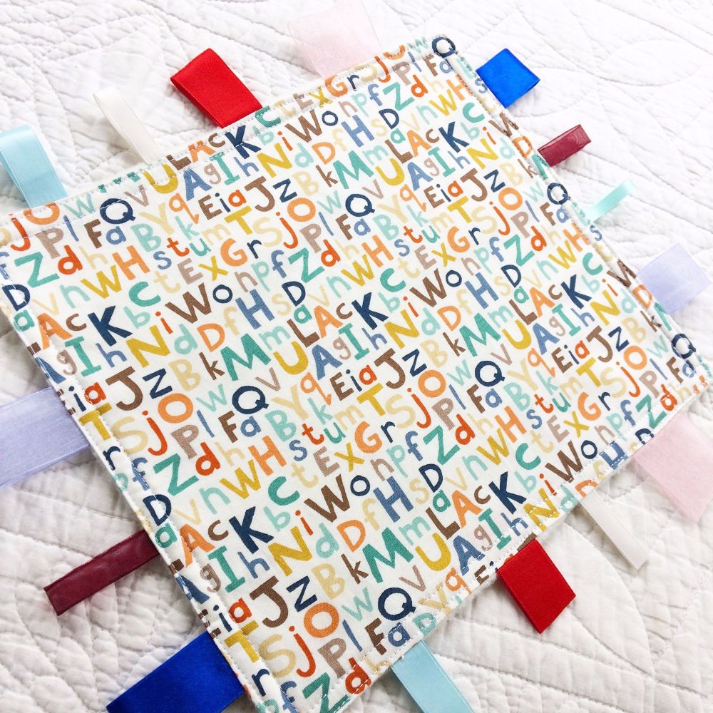 Alphabet letters baby taggy blanket