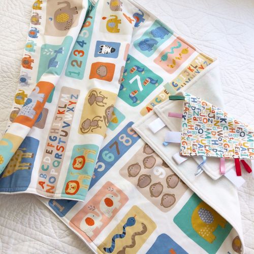 Safari Jungle animals baby cot blanket and matching taggy blanket by Jellib