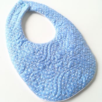 Quilted embroidered shooting stars baby bib 