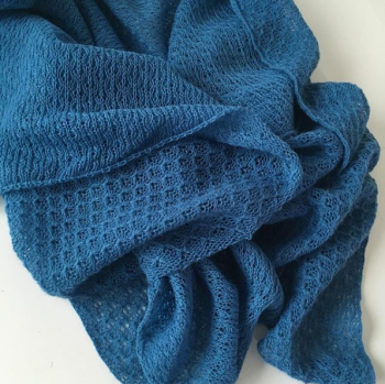 Knitted blue baby blanket