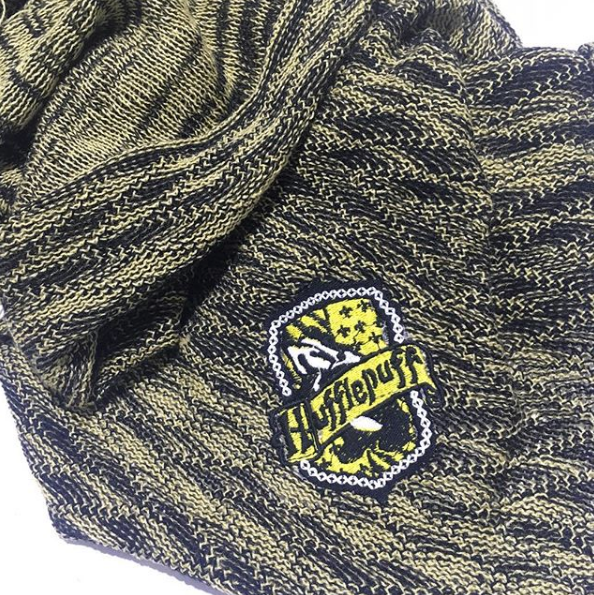Knitted magical gold and black baby blanket