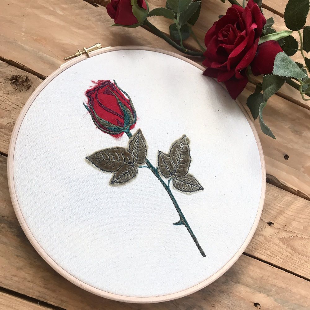 Embroidered and appliquéd rose wall art