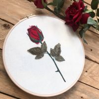 Embroidered and appliquÃ©d rose wall art