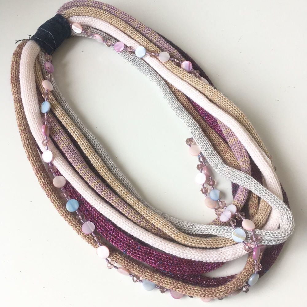 pink and purple tone infinity scarf necklace