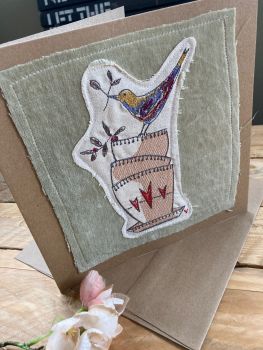 Embroidered bird and tea cups greetings card 