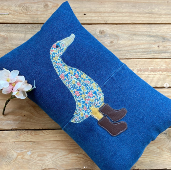 Embroidered and applique duck cushion