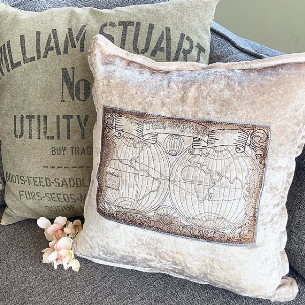 Embroidered vintage map cushion 