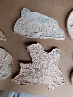 Stamp tiles I made from my lino cuts at my son-in-law's Mud Fox Ceramics in County Durham