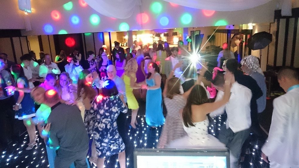 A1 mobile disco crowd on starlit dancefloor