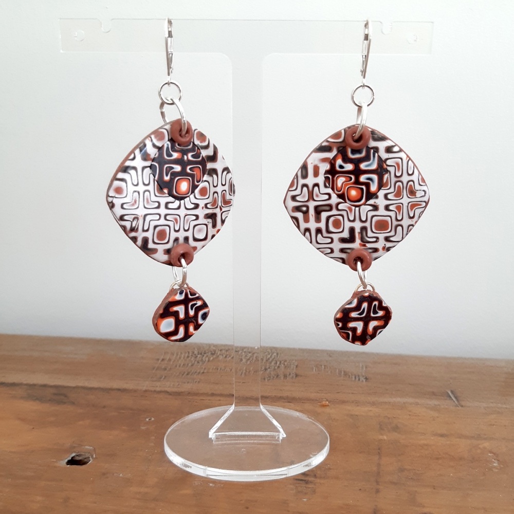Bold Statement Earrings with White Orange and Black Pattern