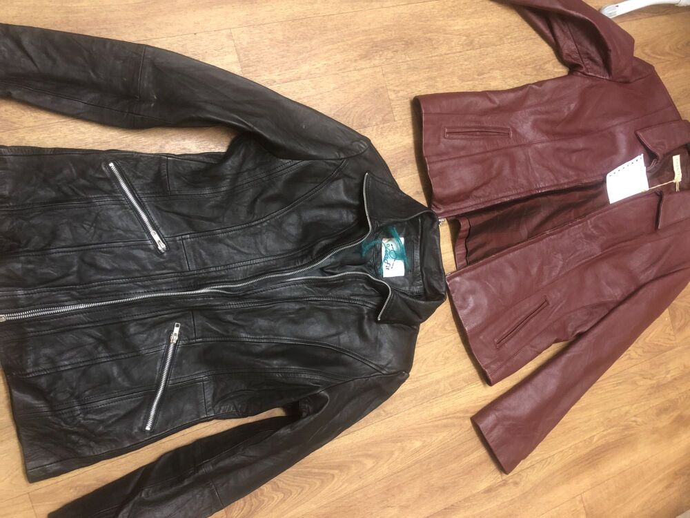 1 Purple and 1 black zip front leather jacket
