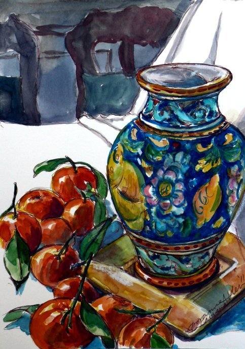 majorlica vase and tangerines