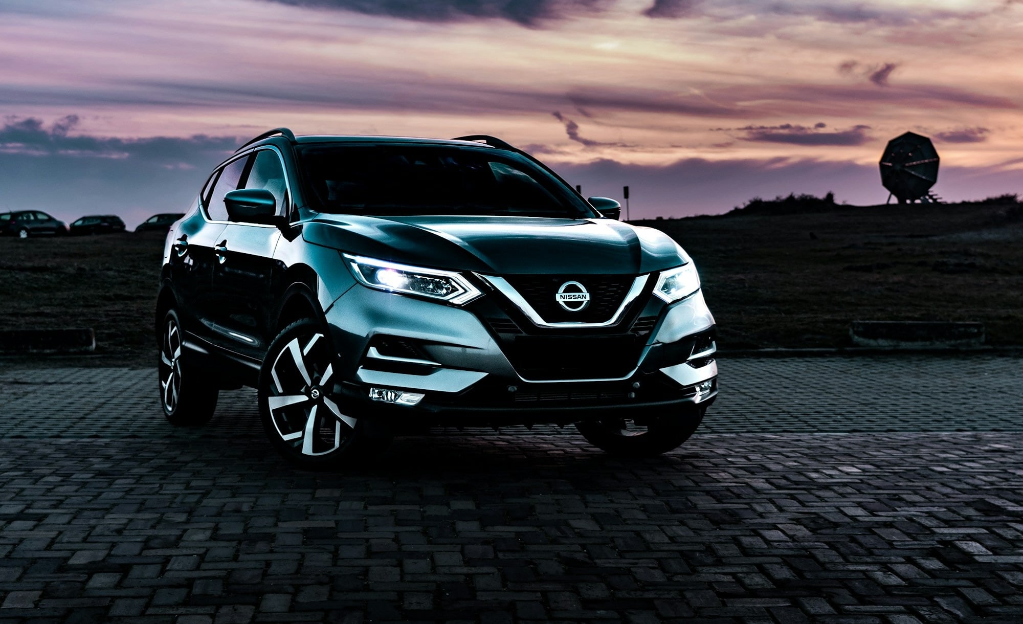 gray-nissan-rogue-suv-outdoor-during-nighttime-iw0D_9wHnf4