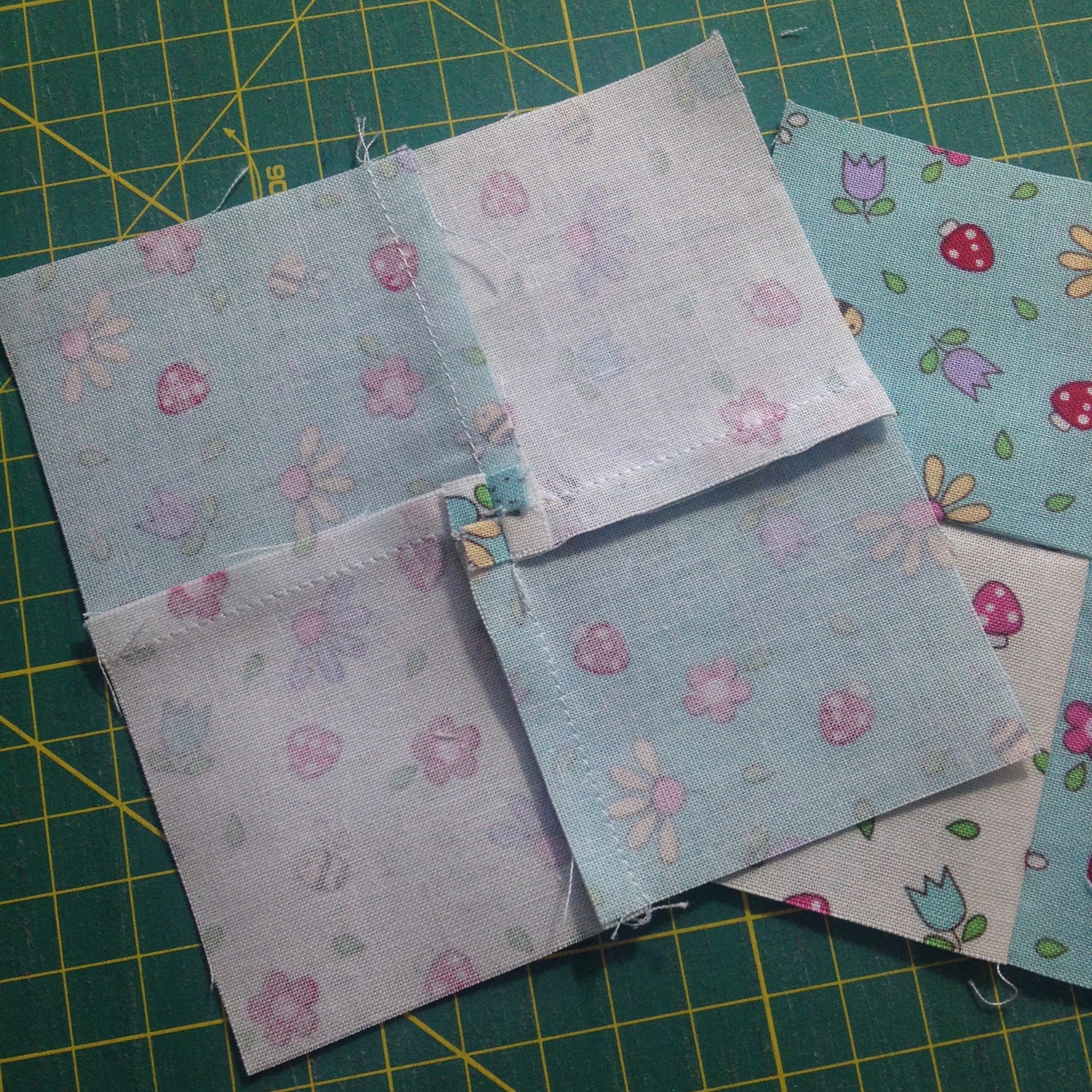 Complete four-patch with charm squares