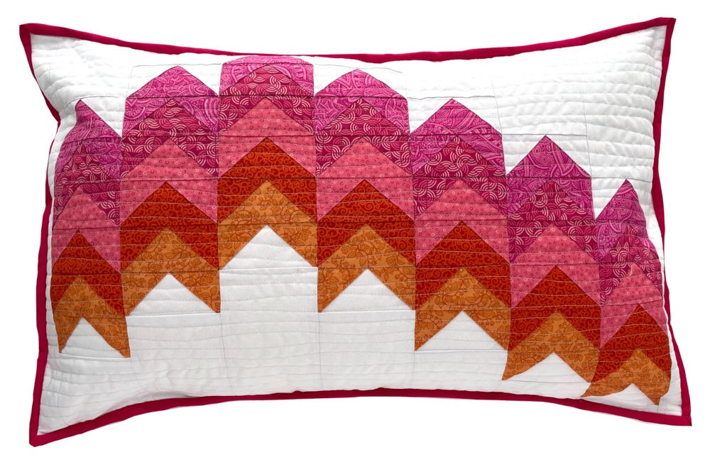 <!-- 001 -->Falling Peaks Cushion in Pinks & Orange