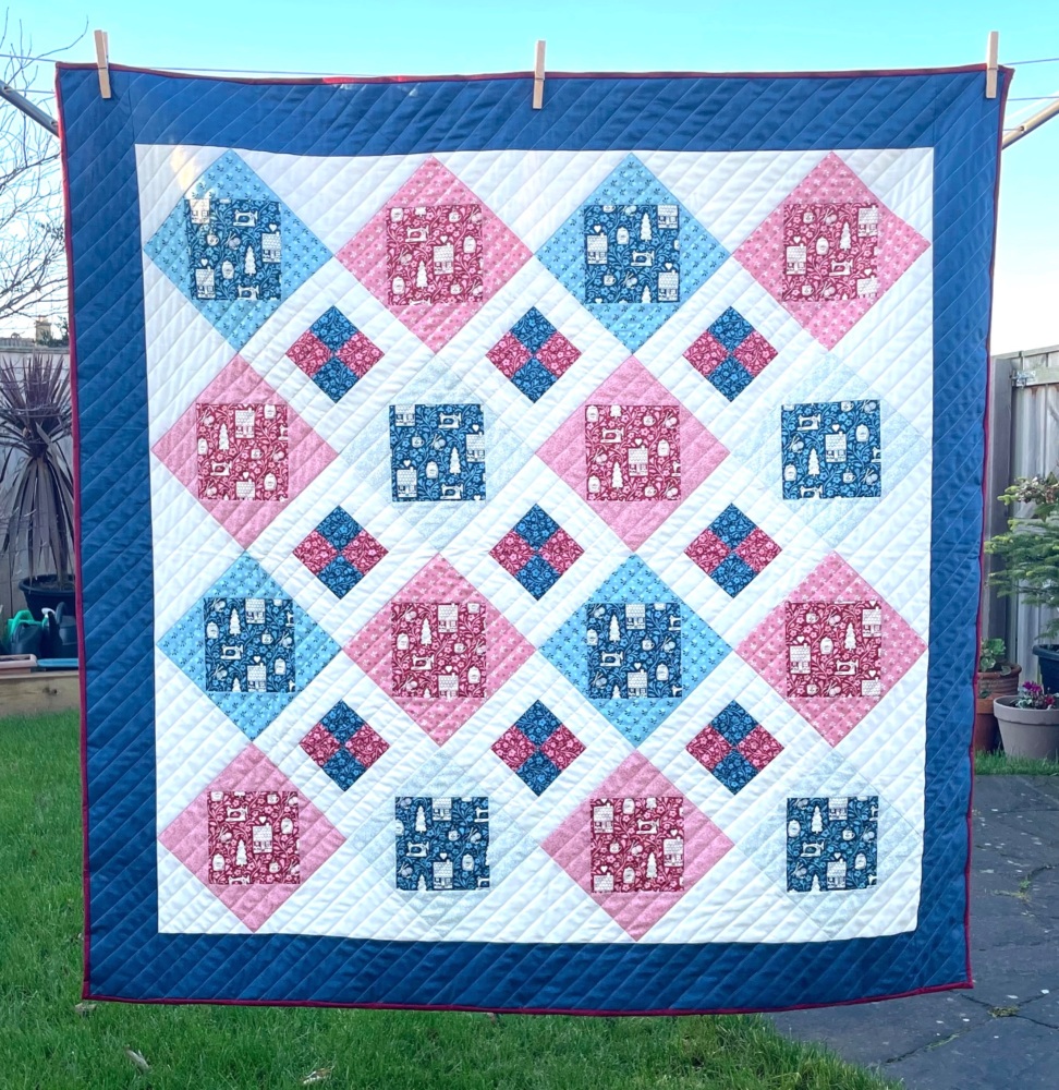 In the Spotlight Lap Quilt in Cosy House