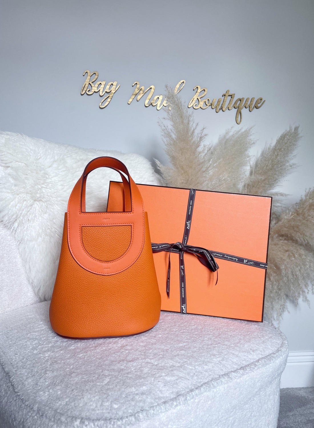In-the-loop leather handbag Hermès Orange in Leather - 34769515
