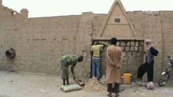 Repairing the door of Sidi Yahia