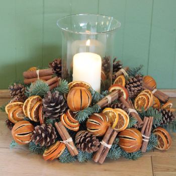 1u. Orange and Cinnamon Hurricane Arrangement