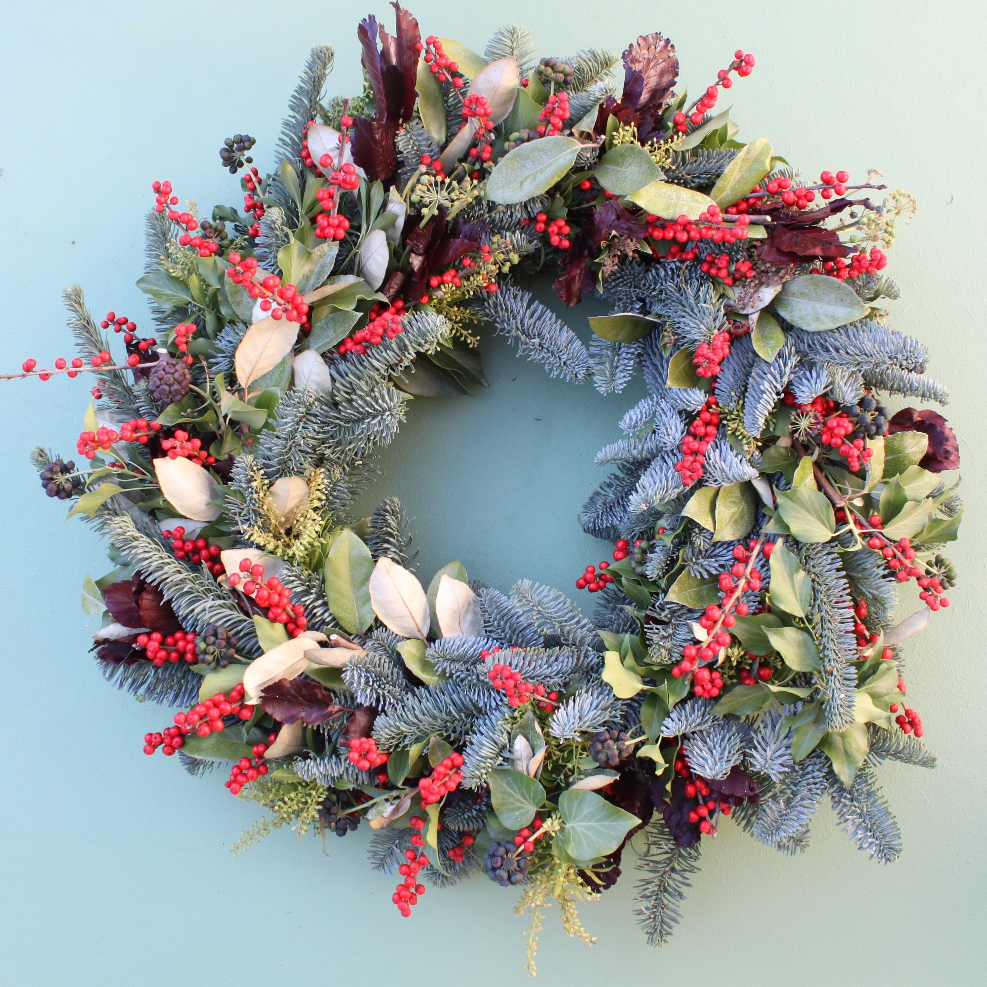 ilex and foliage christmas door wreath