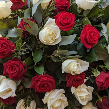 82. Red & Ivory Rose Coffin Spray. Price From