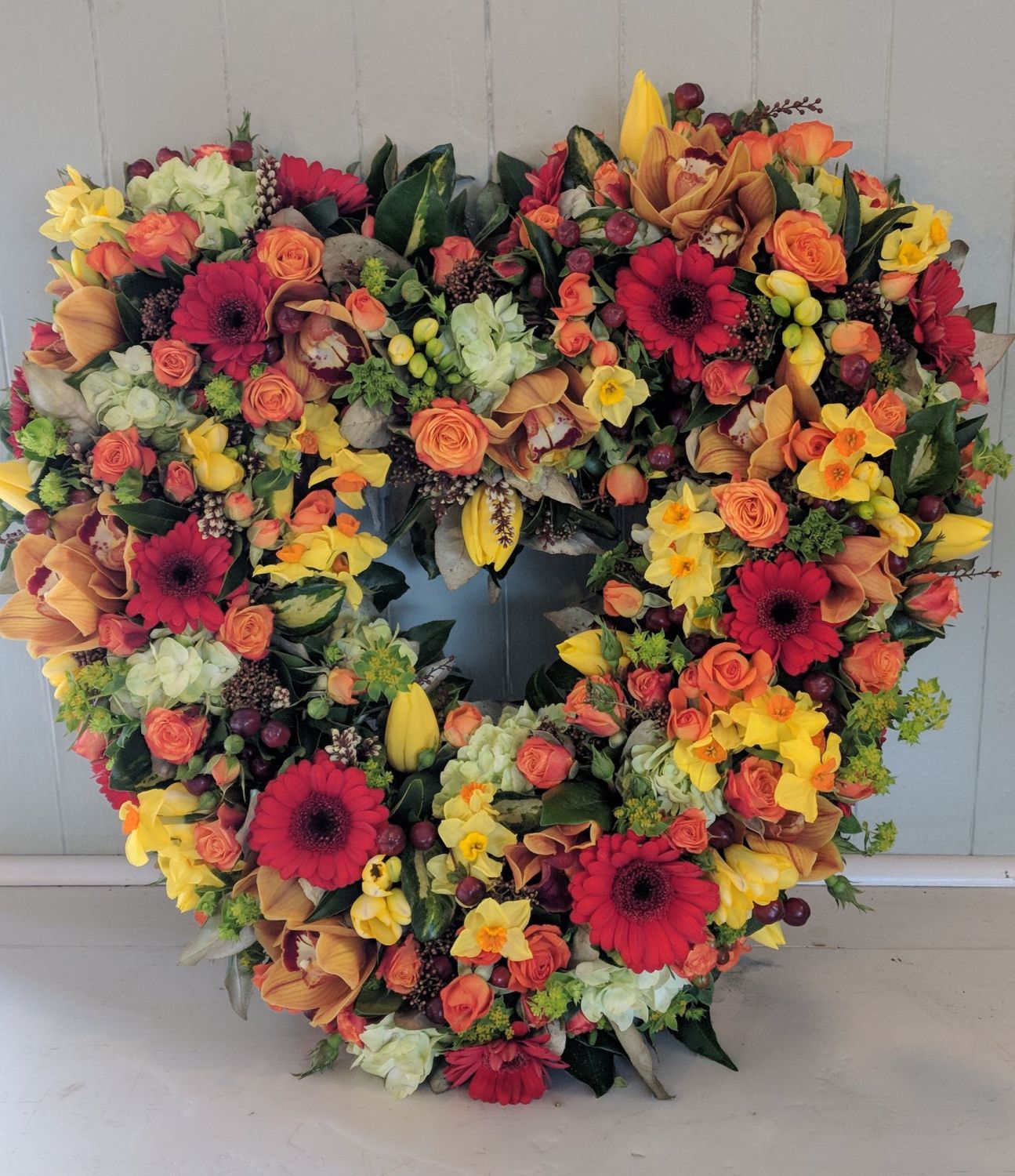 Send a Rose, Freesia and Orchid heart funeral flower ...