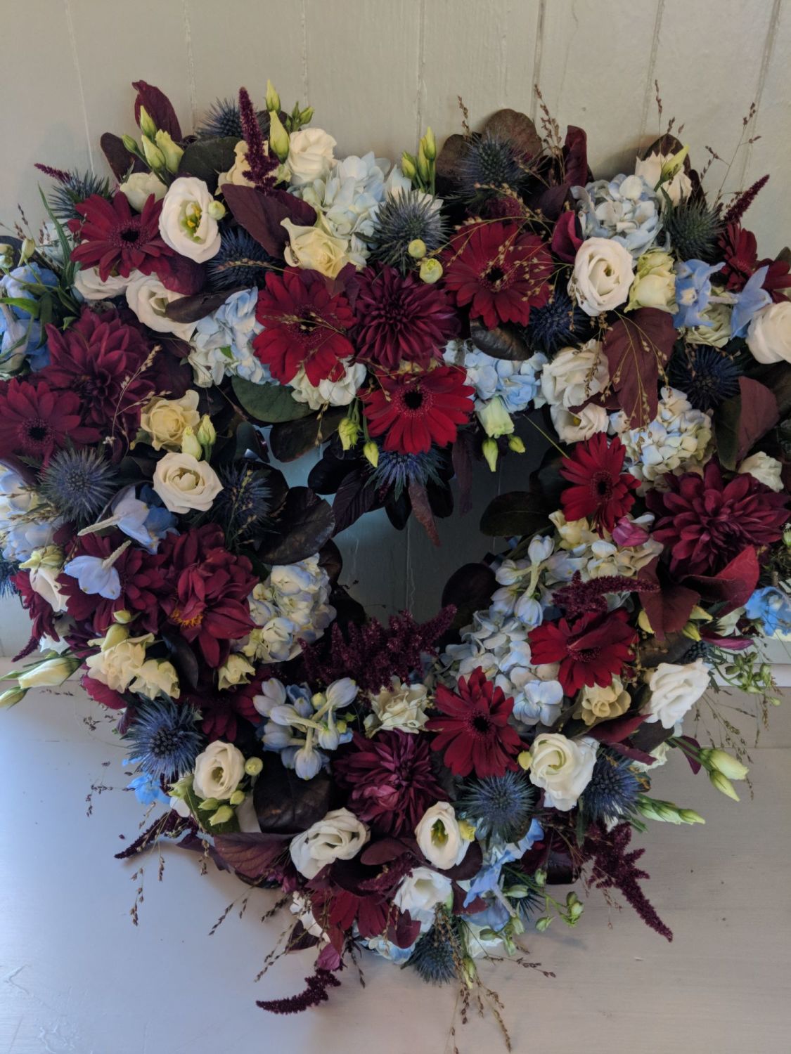 Send A Rose Freesia And Orchid Heart Funeral Flower Tribute To Sussex