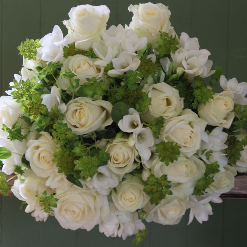 Ivory Avalanche Rose and White Freesia Bouquet. Price from