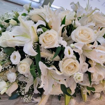 17. White Lily, Roses, Lisianthus & Babies Breath Coffin Spray. Price From