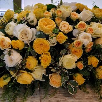 20. Simply Yellow Roses Coffin Spray. Price From