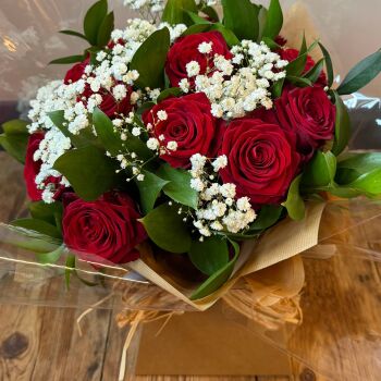 2. Red Naomi roses, gypsophila & foliage bouquet in water. Price from