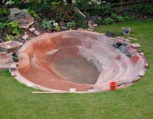 Cemented pond clearly showing plant shelves