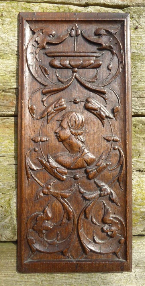 16th century english carved oak romayne panel