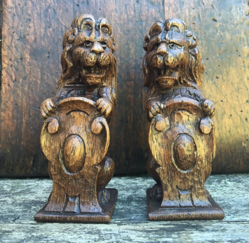 A Pair Of 17th Century Carved Oak Rampant Lion Finials