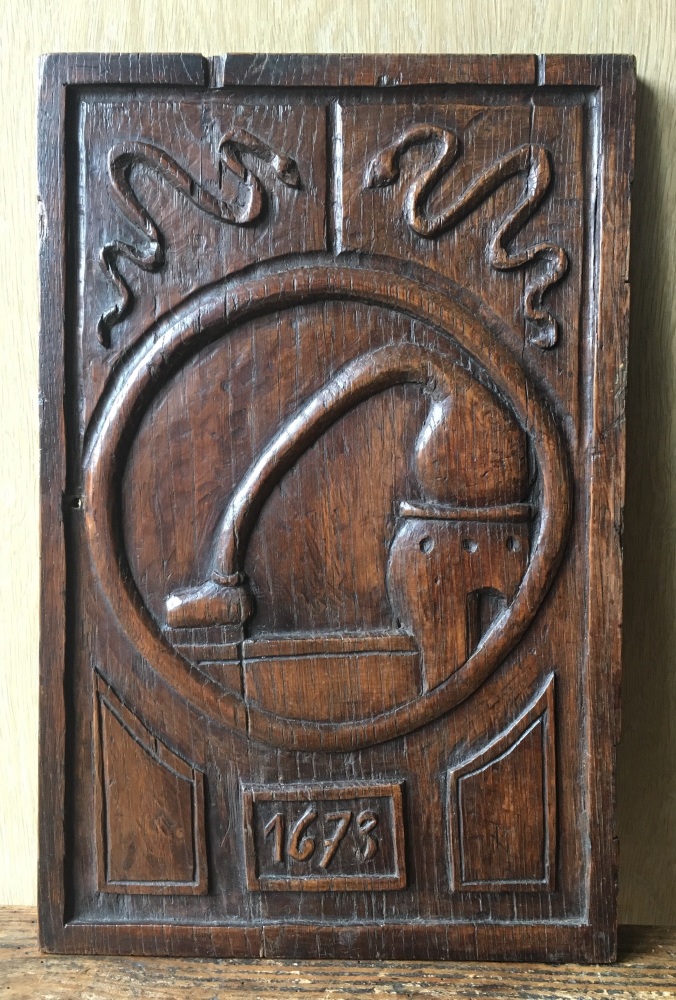 A Rare 17th Century Carved Oak Panel Dated 1673 Of medical interest SOLD