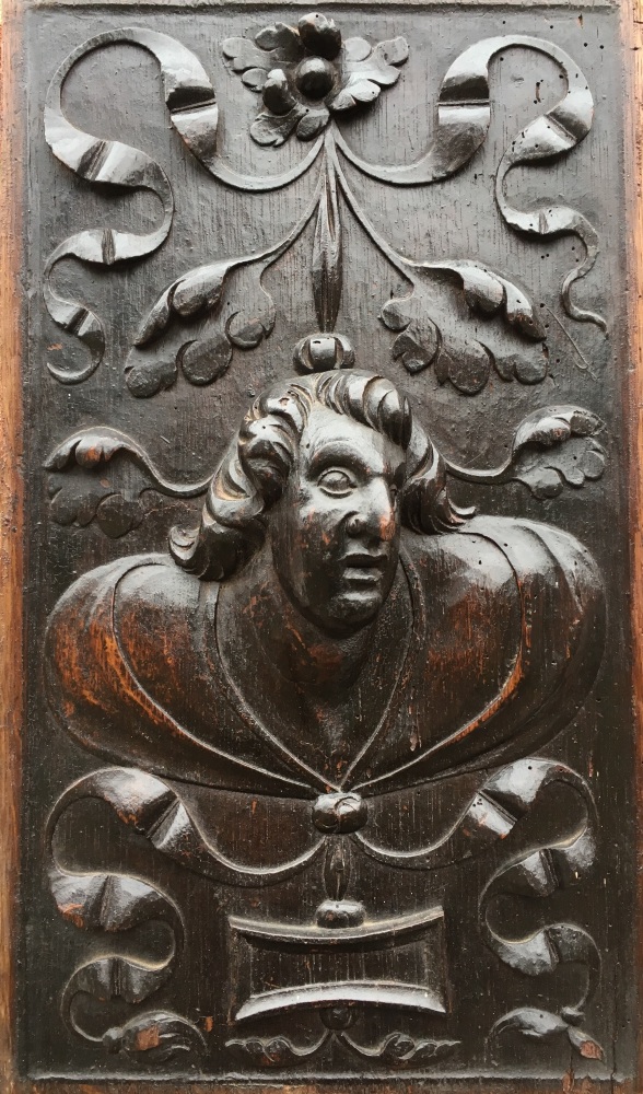 A 16th Century Carved Oak Renaissance profile panel of a gentleman