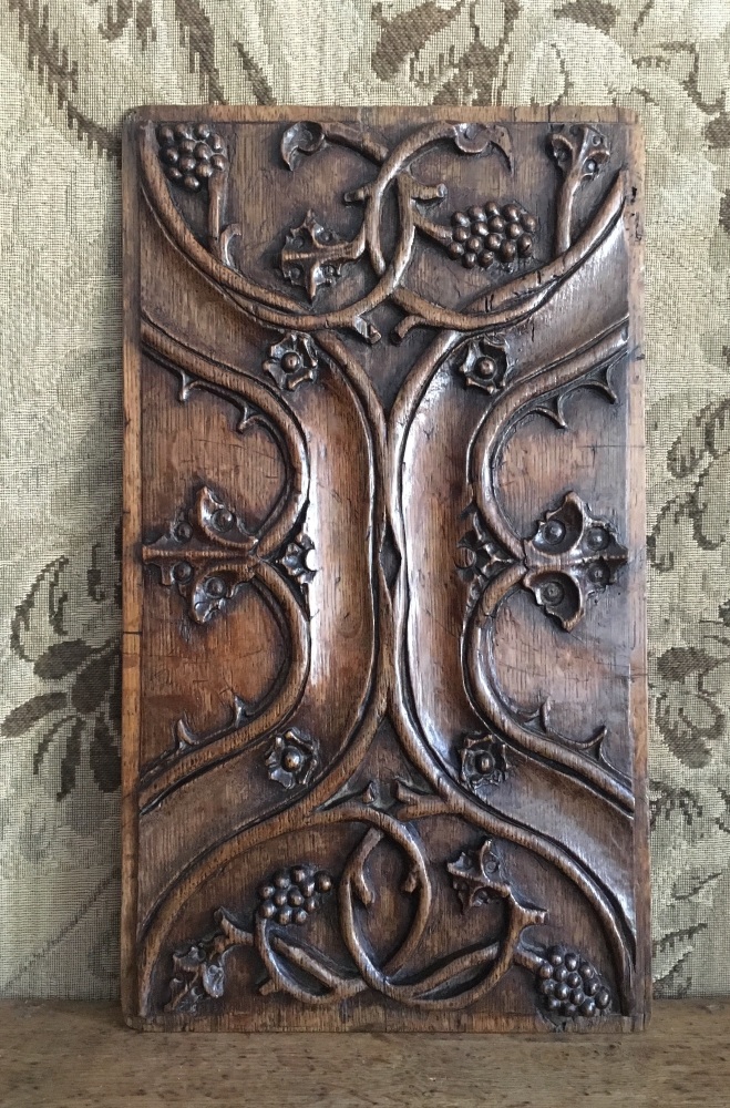 A 16th Century Tudor Carved Oak Panel With Enriched Parchemin ornamentation