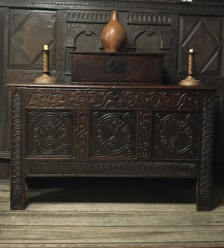 A Wonderful Mid 17th Century Carved Oak Coffer Of Transitional Form.SOLD