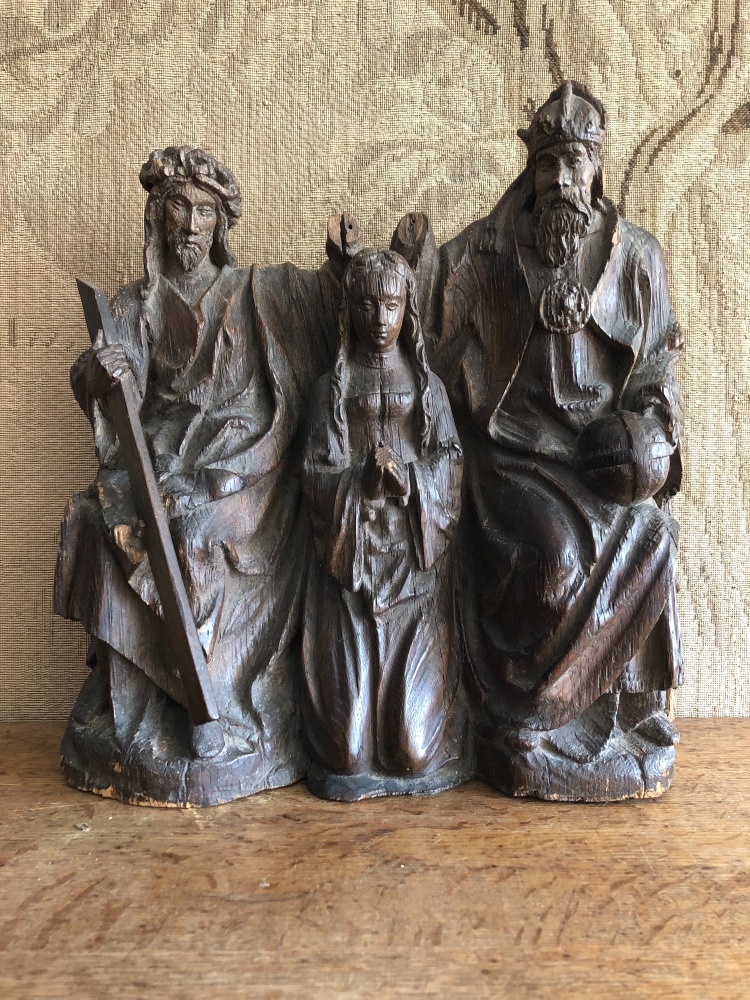 A Rare 15th Century Carved Oak Depiction Of The Coronation Of The Virgin Sold